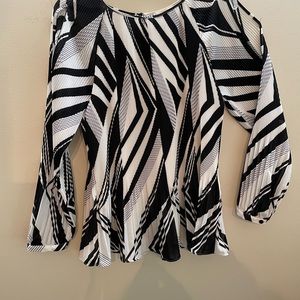 Chico brand very classy unique blouse.